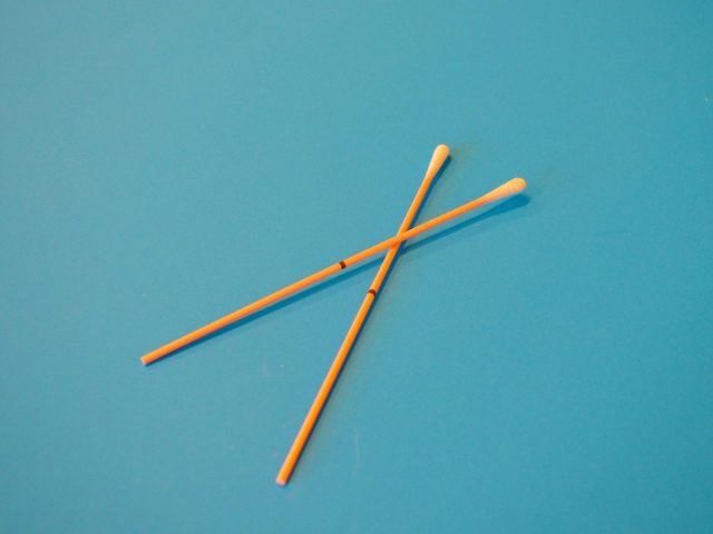 brown wooden sticks on blue surface